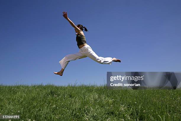 Leaping Example Picture Woman Leaping Over Photos and Premium High Res Pictures - Getty Images