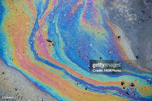 oil slick - spill stock pictures, royalty-free photos & images
