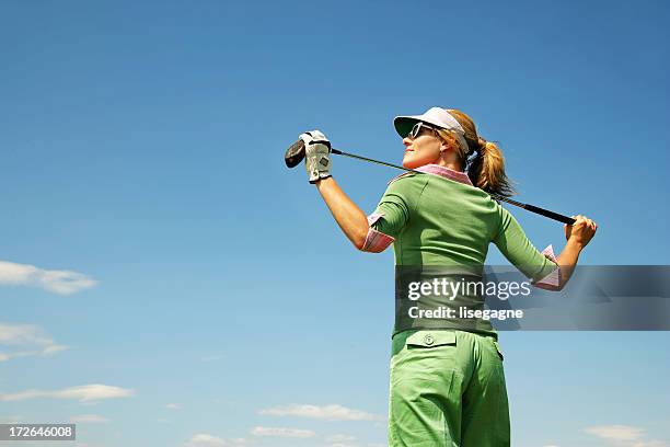 golfer standing - women golf stock pictures, royalty-free photos & images