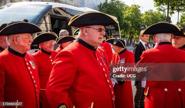 Chelsea pensioners wait at the entrance to Horse Guards Parade in Whitehall, London, to be admitted to a VIP area for Queen Elizabeth's Platinum...