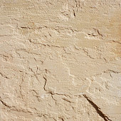 Beige sandstone texture in sun