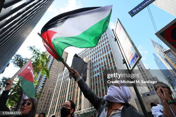 Pro-Palestinian demonstrators gather in support of the Palestinian people during a rally for Gaza at the Consulate General of Israel on October 09,...