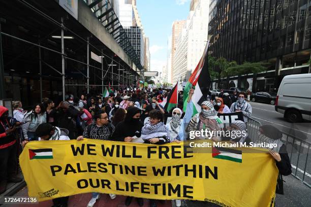 Pro-Palestinian demonstrators gather in support of the Palestinian people during a rally for Gaza at the Consulate General of Israel on October 09,...