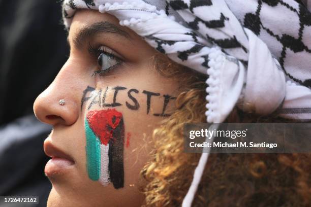 Pro-Palestinian demonstrators gather in support of the Palestinian people during a rally for Gaza at the Consulate General of Israel on October 09,...