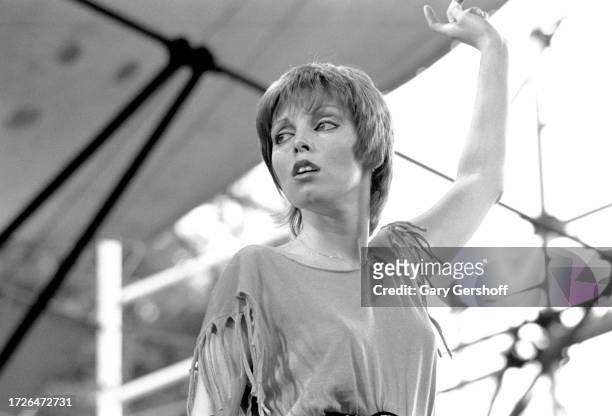 American Rock singer Pat Benatar performs onstage during the Dr Pepper Summer Music Festival in Central Park, New York, New York, July 25, 1980.