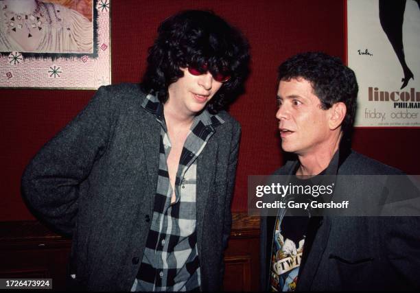 View of American Rock musicians Joey Ramone and musician Lou Reed during an after-party at Jerry's restaurant, New York, New York, October 17, 1984....