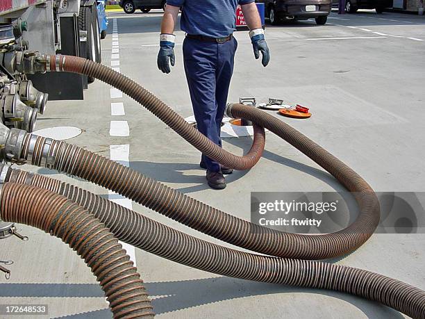 pumping gas 3 - industrial hose stockfoto's en -beelden