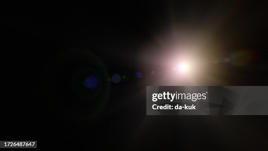 Natural lens flare overlay on black background design element Natural lens flare overlay on black background design element
