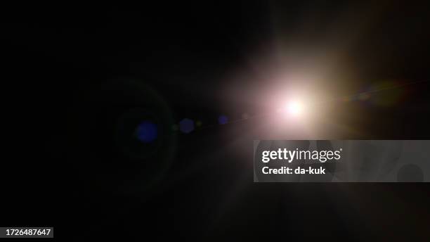 natural lens flare overlay on black background design element - light flare stock pictures, royalty-free photos & images