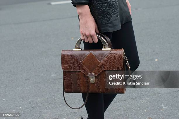 Model Tessa Bennenbroek wears a Zara skirt and vintage bag on day 3 of Paris Collections: Womens Haute Couture on July 03, 2013 in Paris, France.