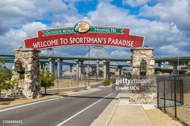 Welcome banner over entrance to the Bass Pro Shops and Ducks Unlimited pyramid building in Memphis, Tennessee.