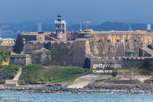 Thick walls and lighthouse of the Castillo San Felipe del Morro in San Juan, Puerto Rico.