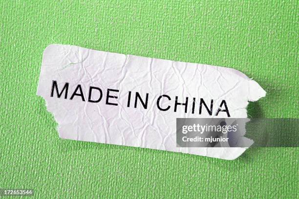 made in china green (macro) - made in china tag stock pictures, royalty-free photos & images
