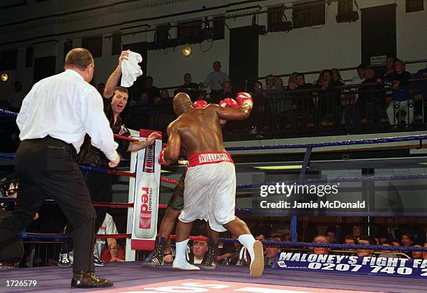 Danny Williams delivers a lethal blow to Michael Sprott as his corner throw in the towel during the British and Commonwealth heavyweight fight...