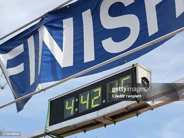 finish line - marathon runner finish line stock pictures, royalty-free photos & images