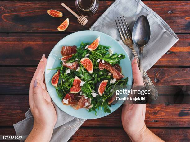 fig salad with arugula, prosciutto and goat cheese - goat cheese stock pictures, royalty-free photos & images