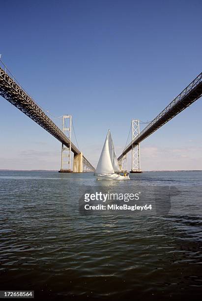 bay bridge with sailboat - annapolis stock pictures, royalty-free photos & images