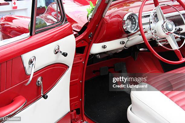 interior of an old red and white classic automobile - leather seats car stock pictures, royalty-free photos & images