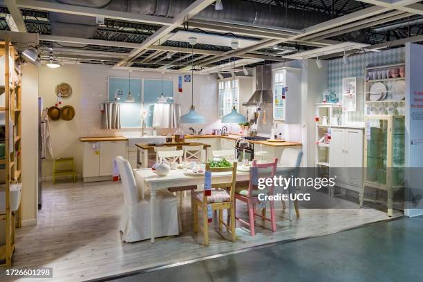 Sample kitchen design layout in showroom inside an Ikea store in the US.