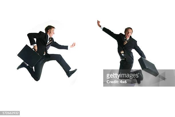 duo businessman - speed - leap forward stock pictures, royalty-free photos & images