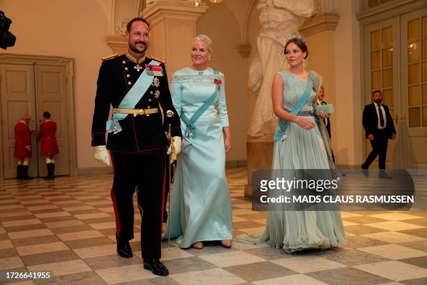 Norway's Crown Prince Haakon and Crown Princess Mette-Marit of Norway with their daughter Princess Ingrid Alexandra are pictured as they arrive at...