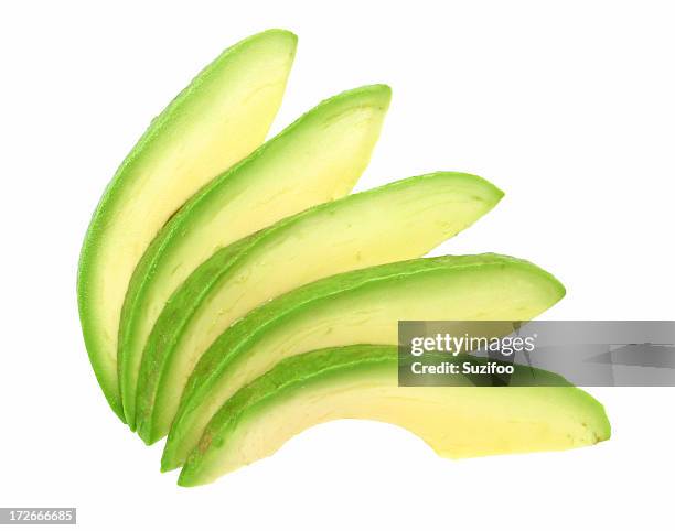 avocado slices - piece stockfoto's en -beelden