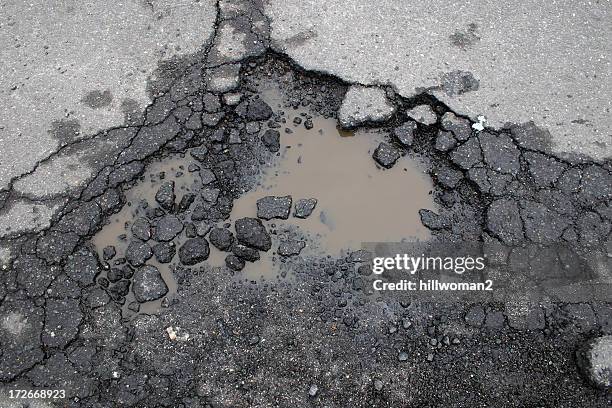 pot hole - tar stock pictures, royalty-free photos & images