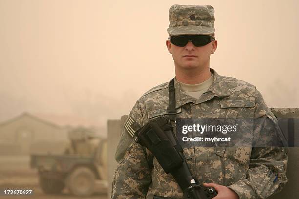 soldier in a sandstorm - sergeant stock pictures, royalty-free photos & images