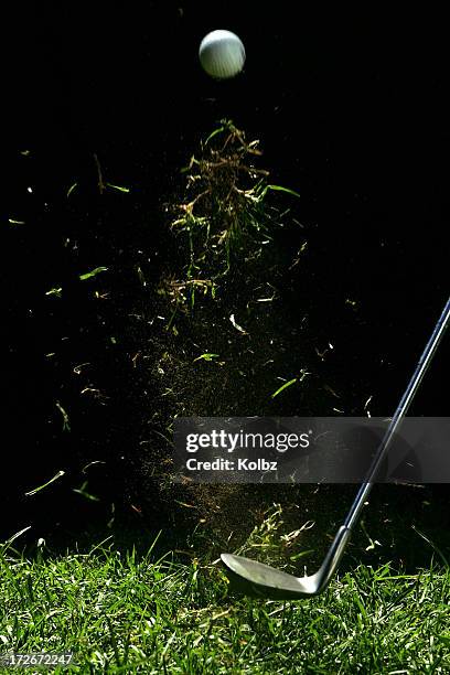 golf ball being hit - golf grass stock pictures, royalty-free photos & images