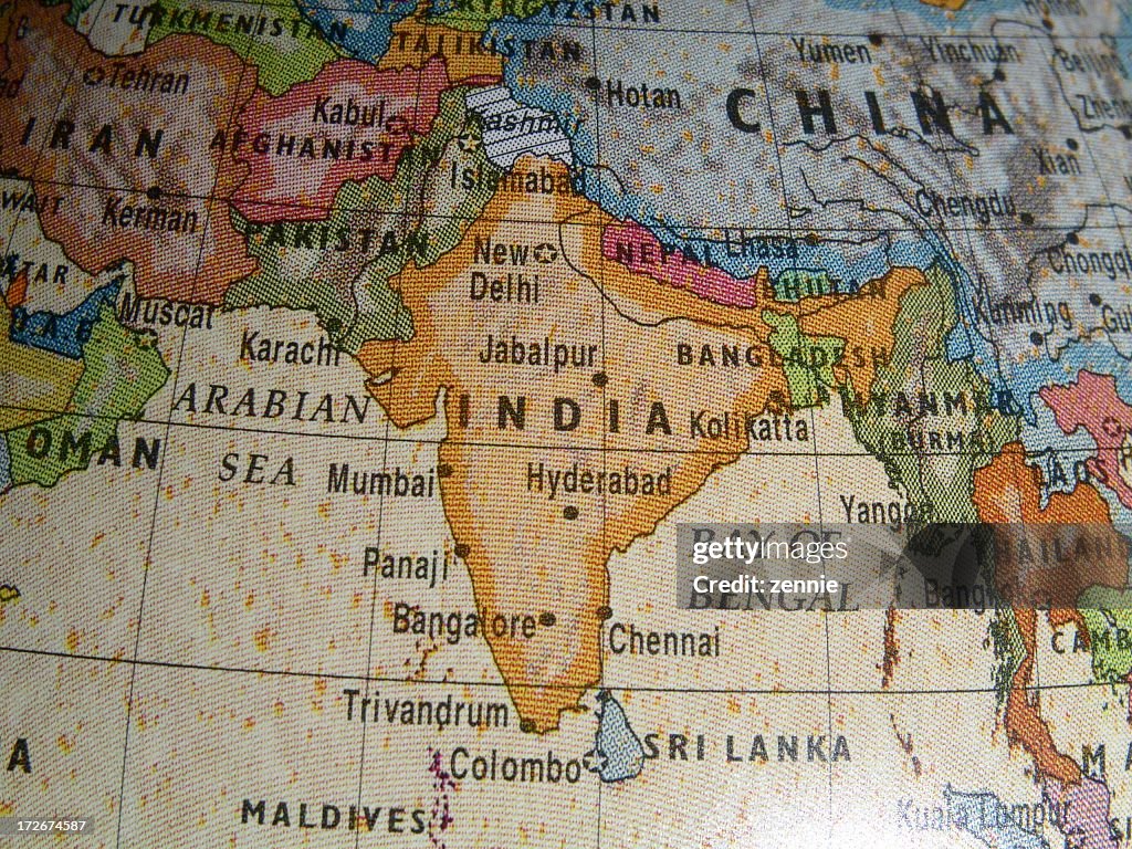 Close up of a world globe with India region in evidence