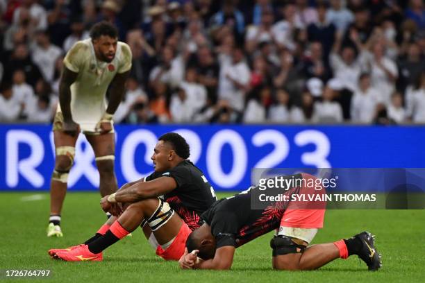 Fiji's flanker Vilive Miramira reacts after losing the France 2023 Rugby World Cup quarter-final match between England and Fiji at the Velodrome...
