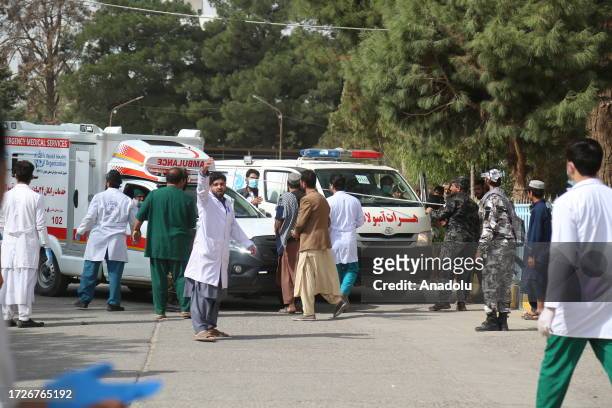 Doctors and paramedics treat the injured earthquake survivors in front of the Herat Regional Specialized Hospital to treated after 6.3 magnitude...