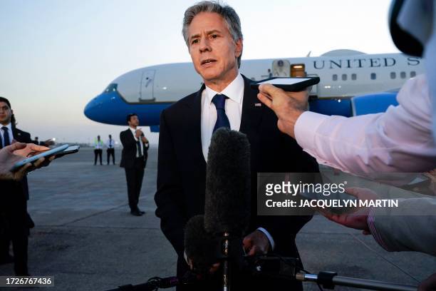 Secretary of State Antony Blinken speaks to the media before boarding his plane in Cairo en route to Jordan on October 15, 2023. Blinken said on...