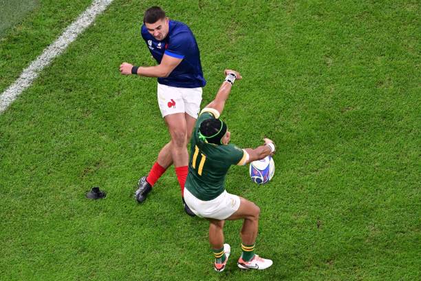 France's full-back Thomas Ramos has his conversion attempt blocked by South Africa's wing Cheslin Kolbe during the France 2023 Rugby World Cup...
