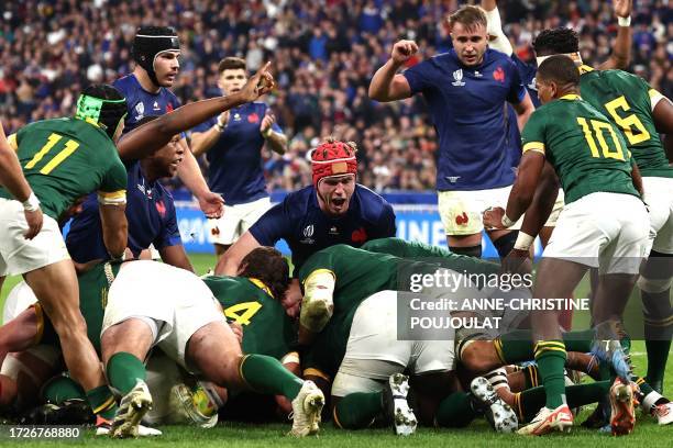 France's lock Thibaud Flament and France's lock Cameron Woki celebrate France's third try during the France 2023 Rugby World Cup quarter-final match...