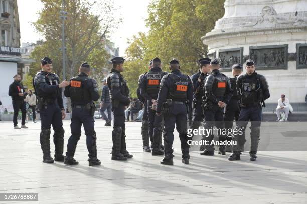 Police officers take security measures after following the latest ban on pro-Palestine protests on October 15, 2023 in Paris, France. French Interior...