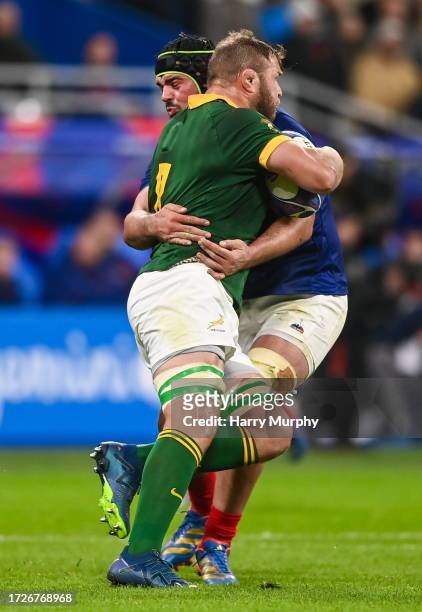 Paris , France - 15 October 2023; Duane Vermeulen of South Africa is tackled by Gregory Alldritt of France during the 2023 Rugby World Cup...