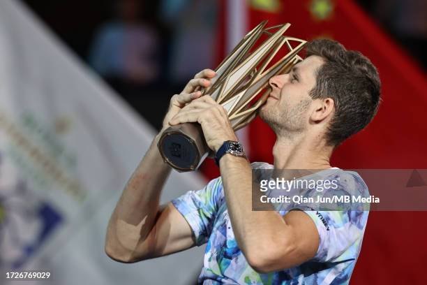 Hubert Hurkacz of Poland poses with the winners trophy after the final match on Day 14 of 2023 Shanghai Rolex Masters at Qi Zhong Tennis Centre on...