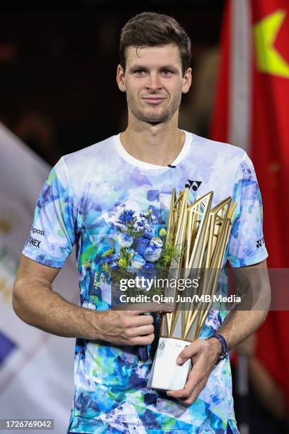 Hubert Hurkacz of Poland poses with the winners trophy after the final match on Day 14 of 2023 Shanghai Rolex Masters at Qi Zhong Tennis Centre on...