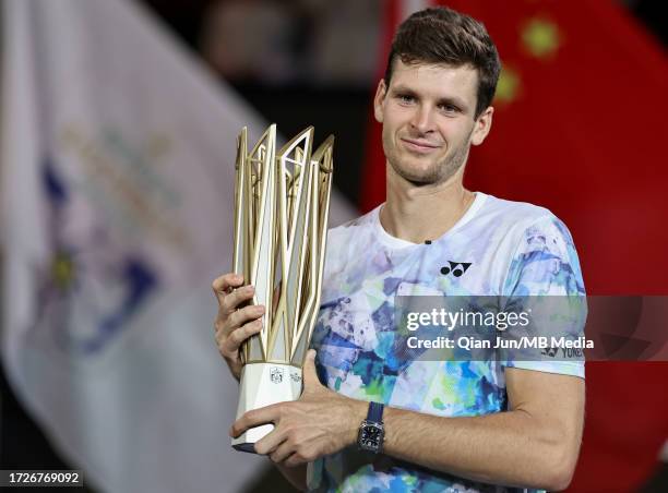 Hubert Hurkacz of Poland poses with the winners trophy after the final match on Day 14 of 2023 Shanghai Rolex Masters at Qi Zhong Tennis Centre on...