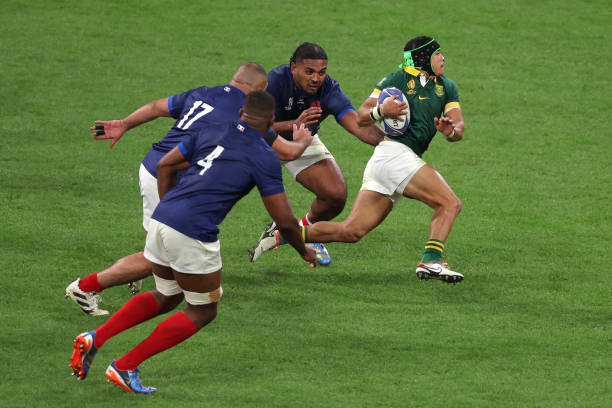 France's hooker Peato Mauvaka tackles South Africa's wing Cheslin Kolbe during the France 2023 Rugby World Cup quarter-final match between France and...