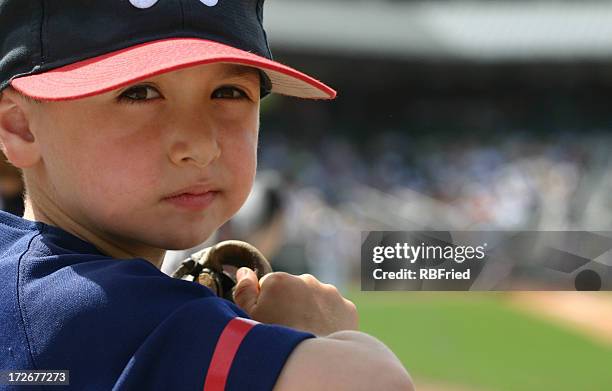 young baseball fan - kid hitting baseball stock pictures, royalty-free photos & images