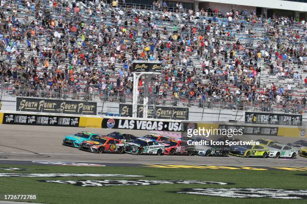 Denny Hamlin and Martin Truex, Jr lead on a restart during the South Point 400 NASCAR Cup Series Playoff race on October 15 Las Vegas Motor Speedway...
