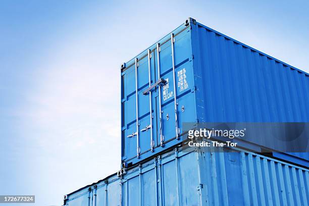 blue containers - shipping container stock pictures, royalty-free photos & images