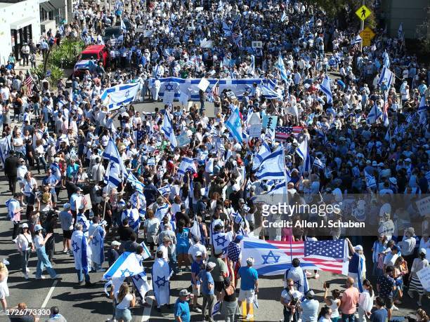 Thousands march as the The Simon Wiesenthal Center, the Museum of Tolerance, the Jewish Federation of Greater Los Angeles and other organizations...