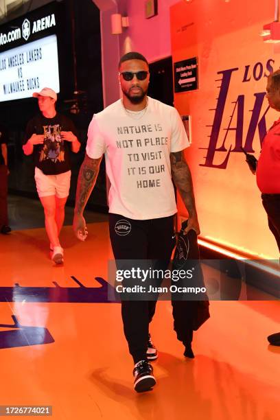 Damian Lillard of the Milwaukee Bucks arrives to the arena before the preseason game on October 15, 2023 at Crypto.Com Arena in Los Angeles,...