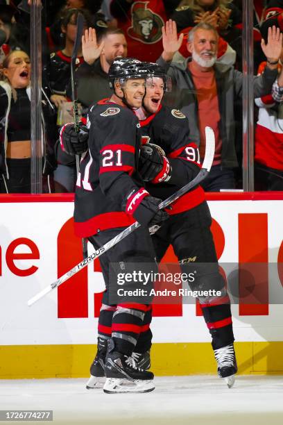 Vladimir Tarasenko of the Ottawa Senators celebrates his first period goal against the Tampa Bay Lightning with teammate Mathieu Joseph at Canadian...