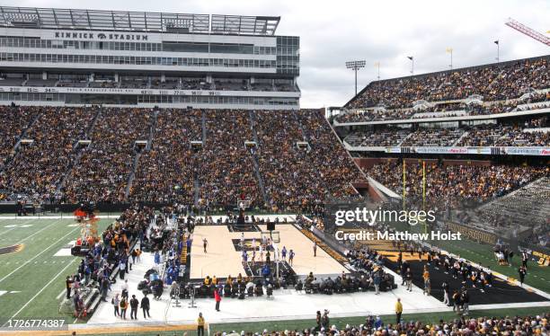 Fans attend the Crossover at Kinnick Event to watch the exhibition match-up between the Iowa Hawkeyes and the DePaul Blue Demons at Kinnick Stadium...