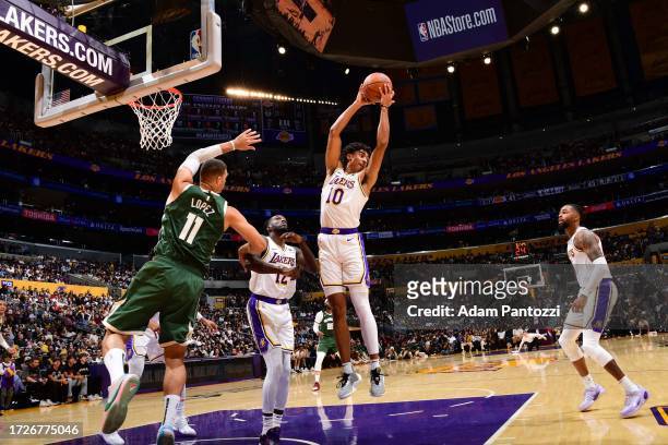 Max Christie of the Los Angeles Lakers rebounds the ball during the game against the Milwaukee Bucks on October 15, 2023 at Crypto.Com Arena in Los...