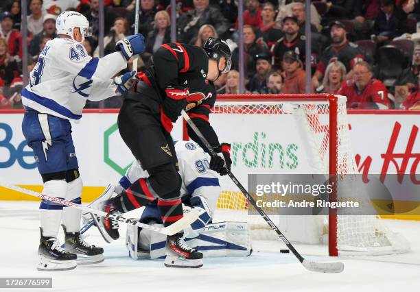 Brady Tkachuk of the Ottawa Senators scores a third period goal against Matt Tomkins of the Tampa Bay Lightning at Canadian Tire Centre on October...